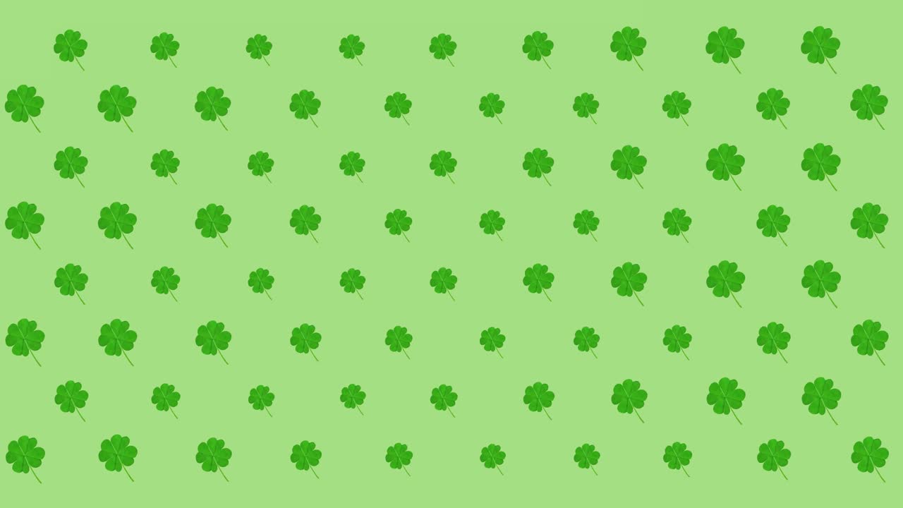 Animazione di file di foglie di trifoglio pulsanti su sfondo verde.