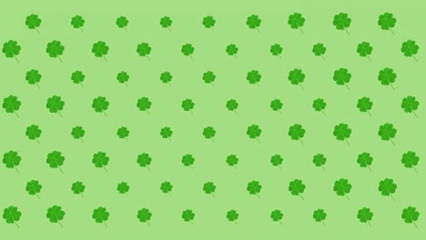 Animación-De-Filas-De-Hojas-De-Trébol-Pulsantes-Sobre-Fondo-Verde