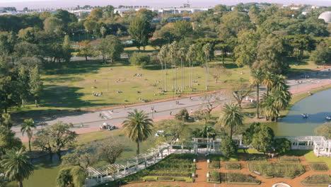 aerial - paseo el rosedal park in palermo, buenos aires, argentina, rising shot