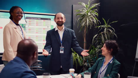 project manager shaking hands and congratulating their newest employee