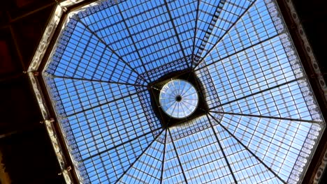 orbit shot around glass roof of palacio da bolsa in porto, portugal