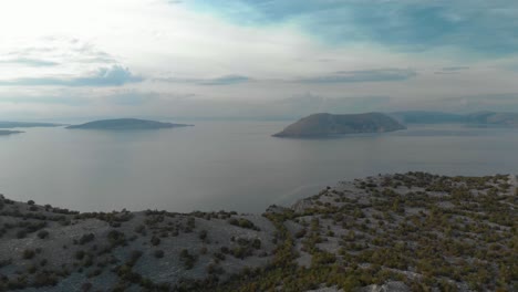 aerial panning shot of rocky seashore and islands in cloudy day-4