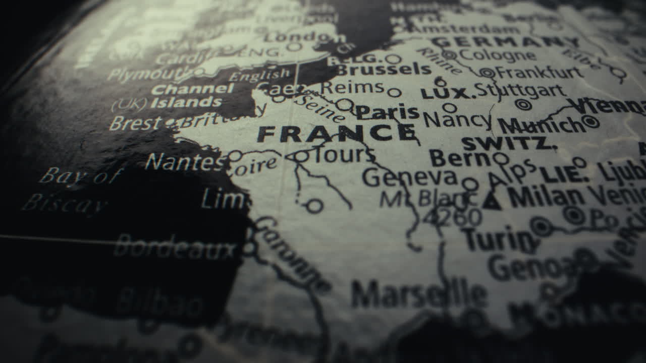 Close-up of a vintage world map focusing on France