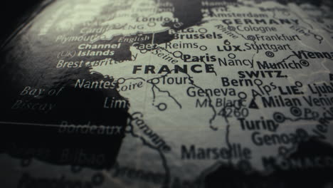 close-up of a vintage world map focusing on france