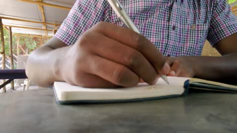 African-male-reading-during-corona