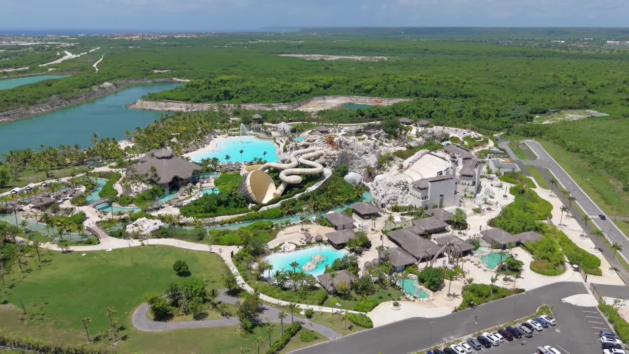 Drone establisher aquapark in the Caribbean with large pool and water slides