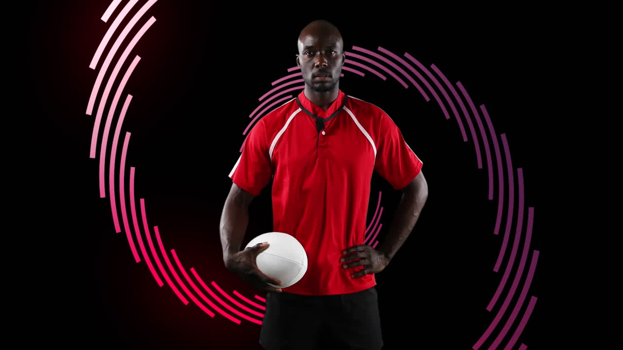 Animation of spiral of red lines rotating over portrait of african american male rugby player