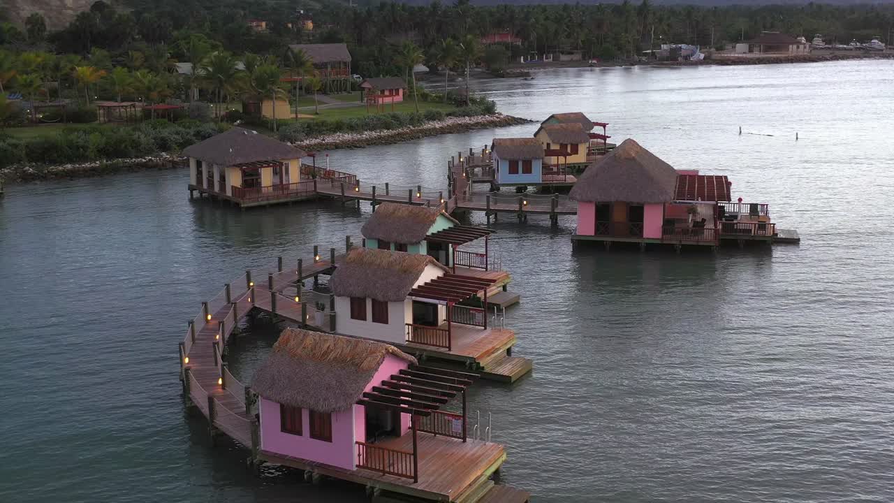 Aerial static view of Luxury wooden water villas resort in Dominican Republic
