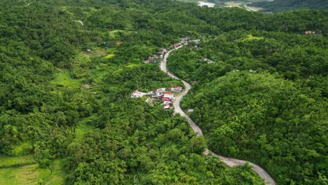 Aerial View Of Road Along The Green Forest And Hills In Bato, Virac, Catanduanes