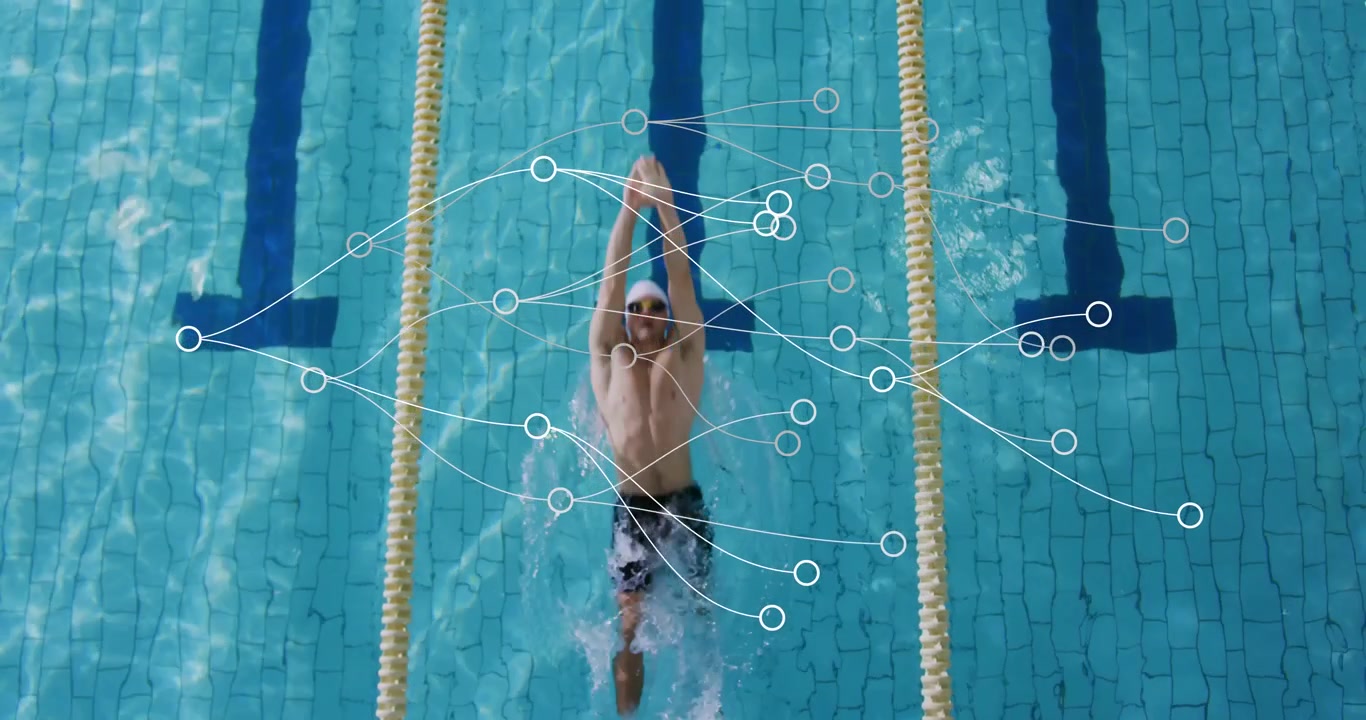 Nadador impulsionando-se do bloco de partida e executando nado costas em piscina de competição para treino de velocidade.