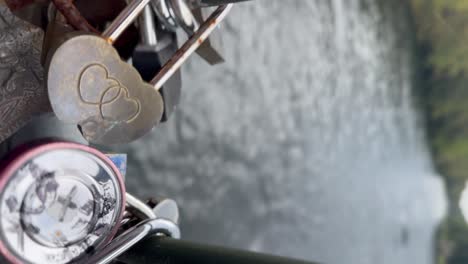 Love-locks-on-a-bridge-over-the-Augusta-Canal---vertical-orientation