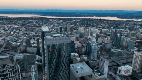 drone shot of seattle's downtown skyscrapers at sunset