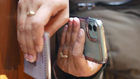 close-up of hands holding a smartphone
