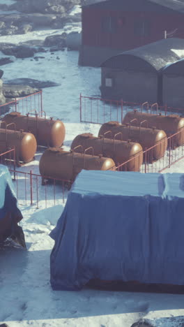 storage tanks covered in snow