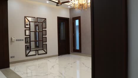 empty room with wall mirror and marble floor