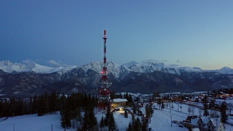 evening view of zakopane-gubalowka transmitter during winter on the gubalowka mountain at zakopane in poland