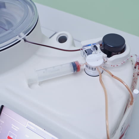 stem cell therapy. plasma in syringe. centrifuge.