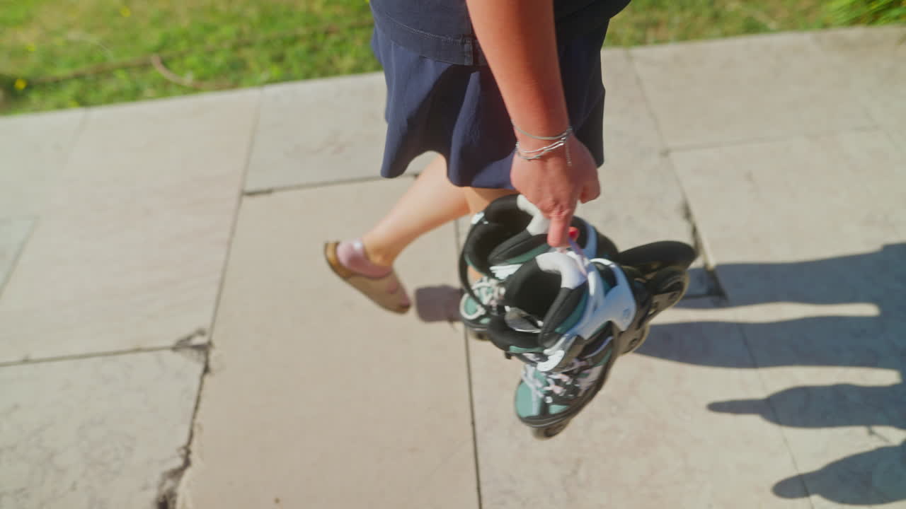 Woman walking with roller skates
