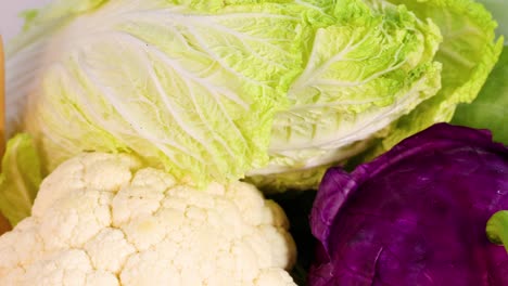 variety of fresh vegetables on white background