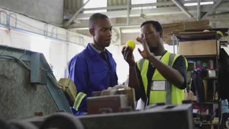 mixed race man working in factory