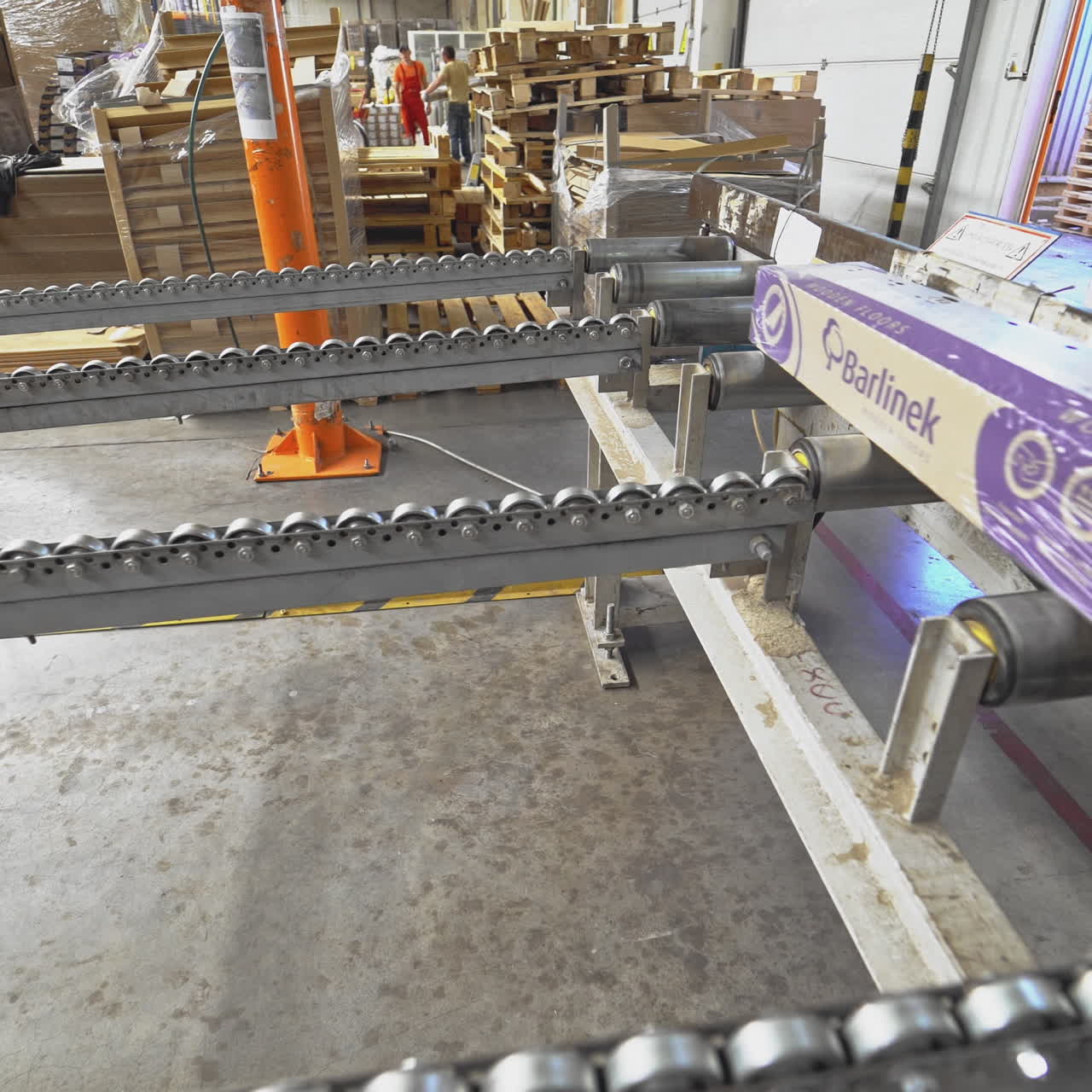 Floorboard production in the industrial factory. Manufacturing of a parquet board. Modern technologies.