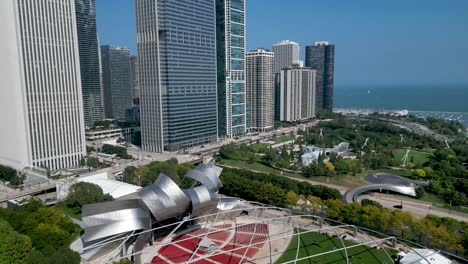 High-resolution-panoramic-drone-aerial-4K-Video-of-the-famous-tourist-attraction-of-Chicago's-Millennium-Park-during-a-beautiful-summer-day