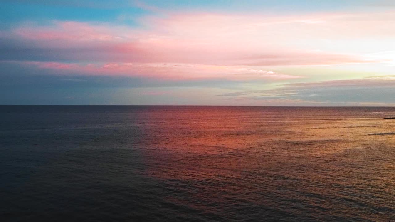 Amazing Cinematic Nusa Dua, Bali beach air footage with exotic and luxurious five stars hotels and resorts during sunset in full HD 1080p.