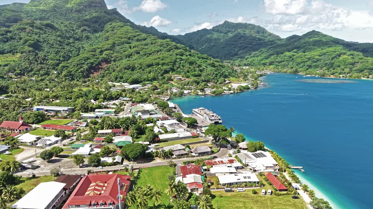 Huahine Island Port, French Polynesia. Drone Shot of Buildings, Ferry Boat and Picturesque Landscape