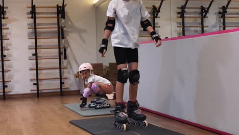 children learning to roller skate