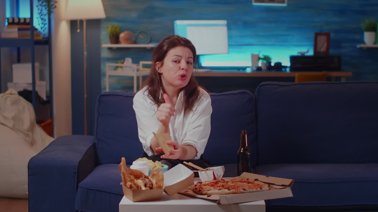 Caucasian woman talking on video call with friend after work