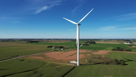 a wind turbine blows in the wind of the wisconsin countryside