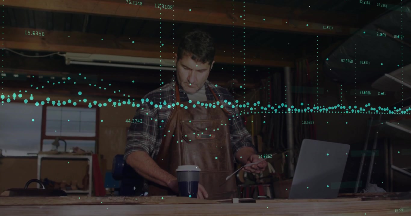 Craftsman Using Digital Tablet in Woodworking Workshop with Data Overlay