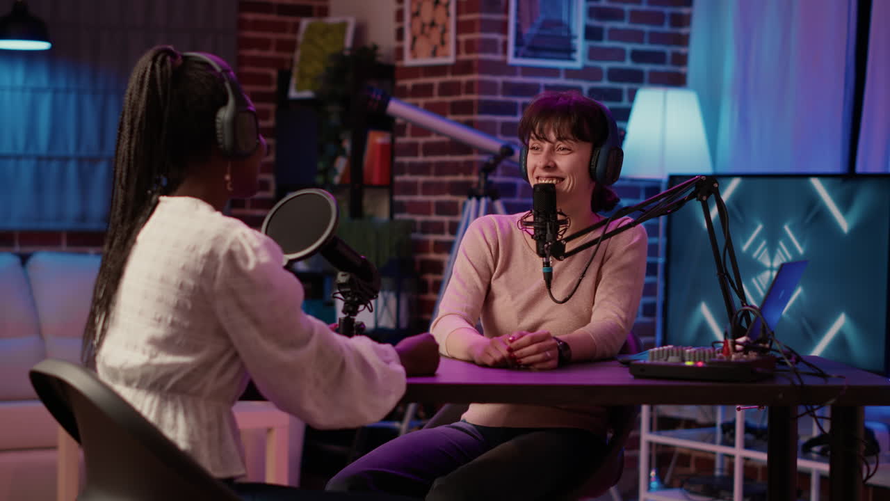 Content creator recording podcast with famous influencer for social media page