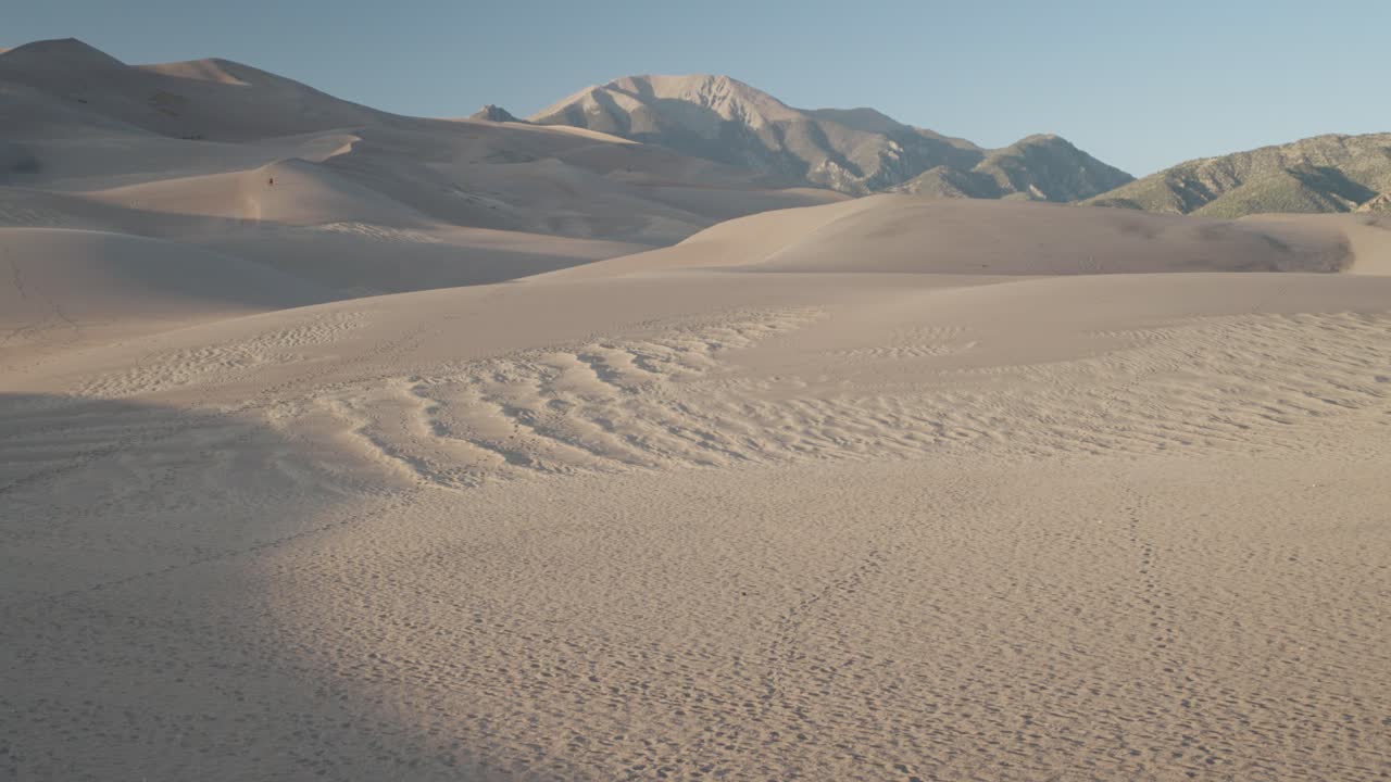 Sand Dunes and Mountains Landscape