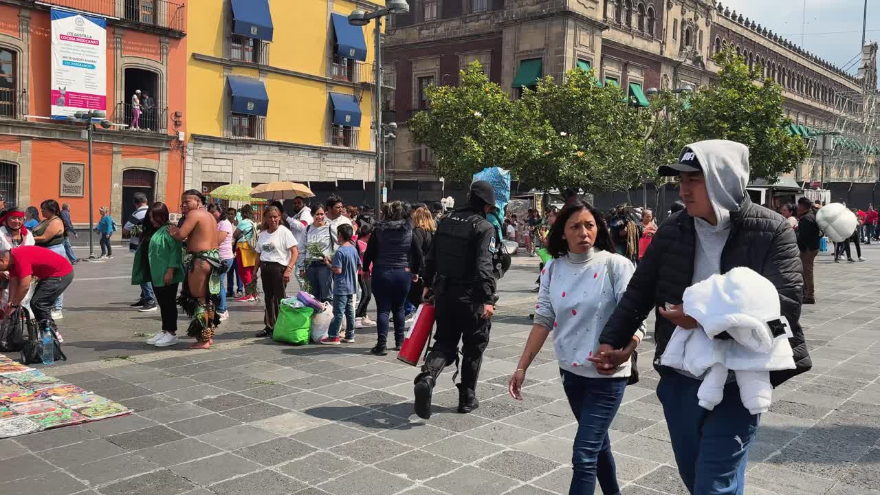People enjoying the surreal street activities in Mexico City