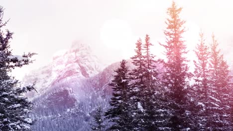 Animation-Leuchtender-Lichtpunkte-über-Fallendem-Schnee-Und-Winterlicher-Berglandschaft
