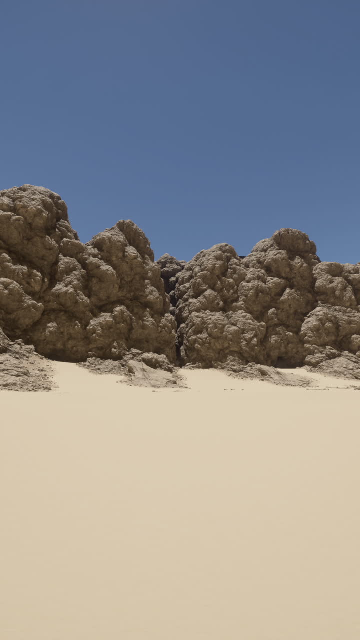 paisaje árido con dunas de arena y formaciones rocosas