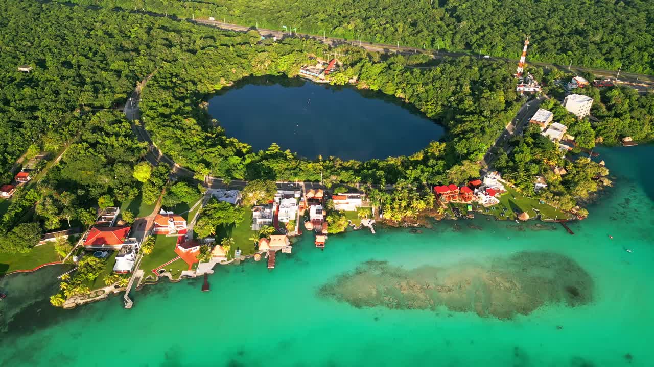 Aerial view of Bacalar, Mexico with lush greenery and vibrant lagoon