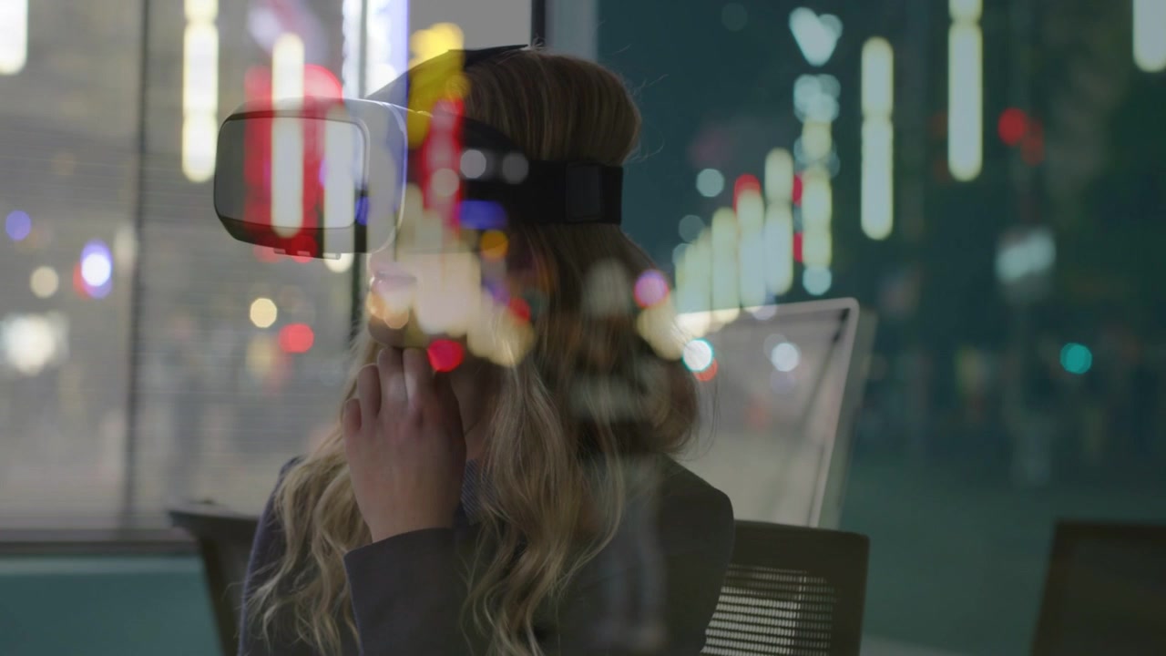 Female worker raising hand to adjust VR headset, inspecting tech UI while neon bokeh on glass