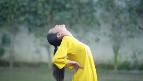 Indian-girl-doing-back-stretch-exercise