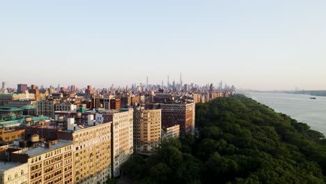 beautiful aerial pan shot of manhattan at golden hour