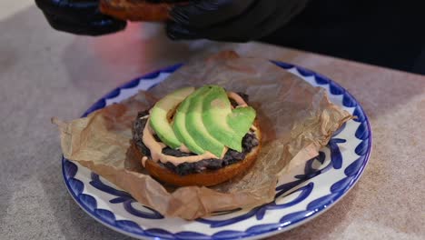 closeup: preparation of healthy vegan burger