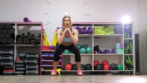 beautiful athletic girl in blue activewear doing plank exercise on yoga mat young woman in leggings and long sleeve sport top has workout outside concept of healthy lifestyle sports training wellness and sport training plank fitness femme in sportswear does a workout