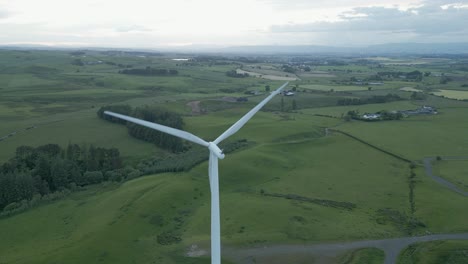 High-angle-static-view:-Whitelee-Windfarm-turbine-spins-in-rural-Scotland