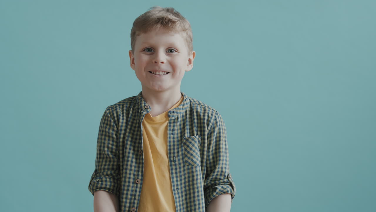 Adorable Boy with Soccer Ball Posing