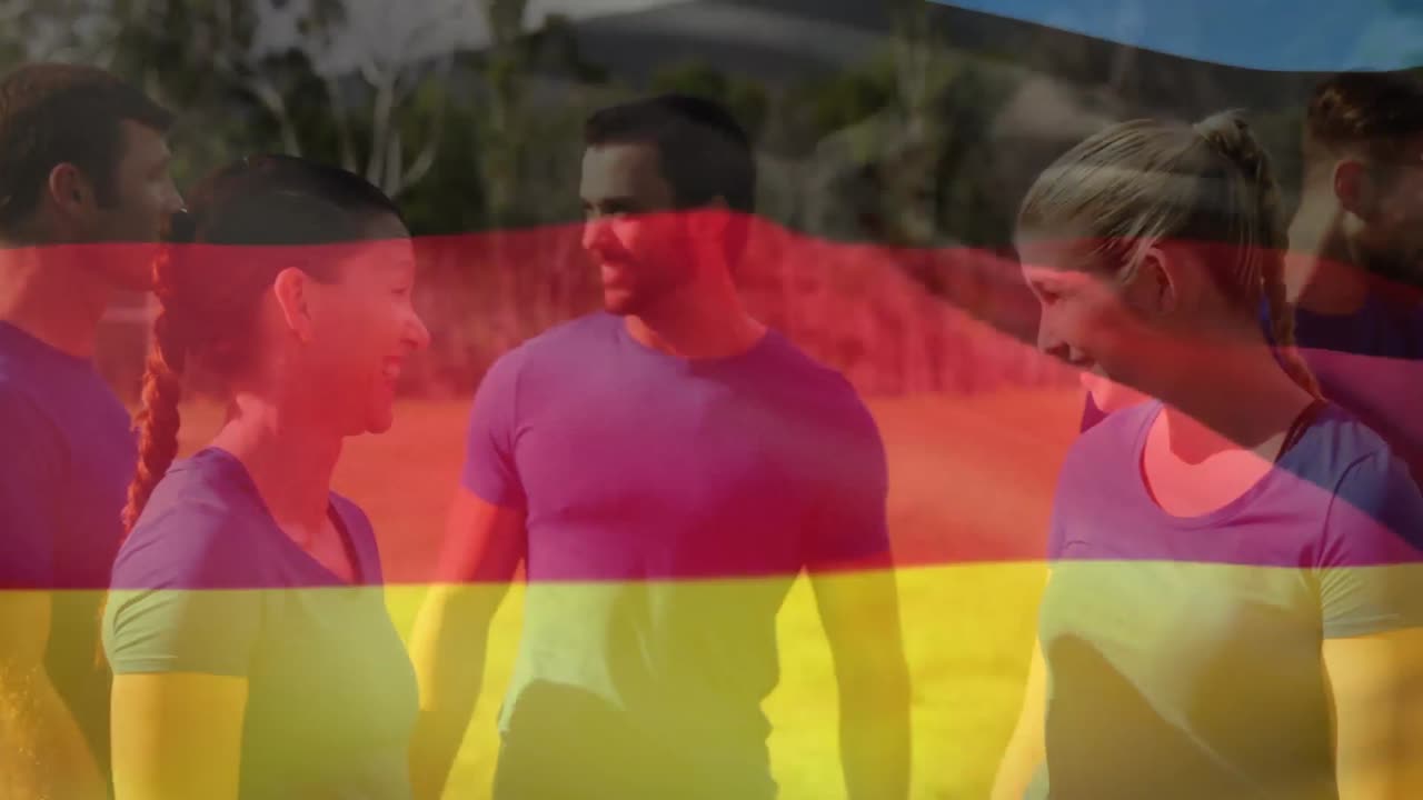 animación de la bandera de alemania ondeando sobre amigos caucásicos en el parque