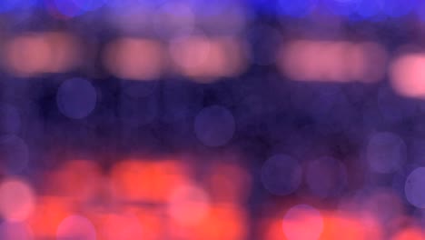 el fondo abstracto de la noche está desfocado con un bonito bokeh. luces de navidad borrosas bokeh. panorámica a través del borrón.