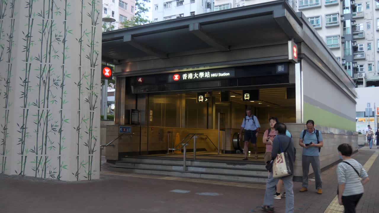 Hidden world unfolds it’s gates, Hong Kong underground entrance waits