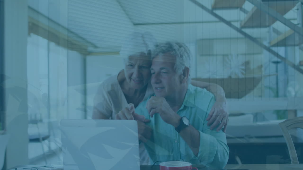 animación de gráficos sobre una pareja caucásica mayor viendo videos en su portátil en casa