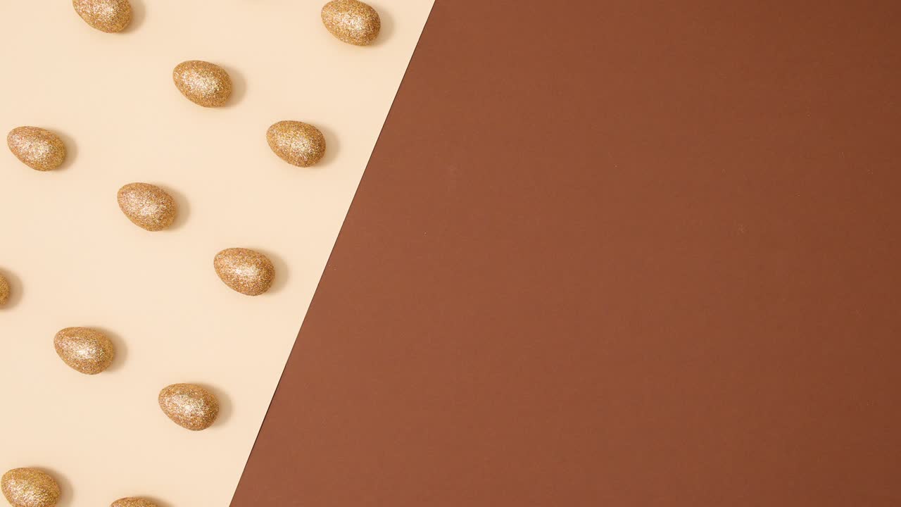 창의적인 움직임의 부활절 패턴 - 누드 갈색 배경에 반이는 달 - 스 모션 플래트 레이